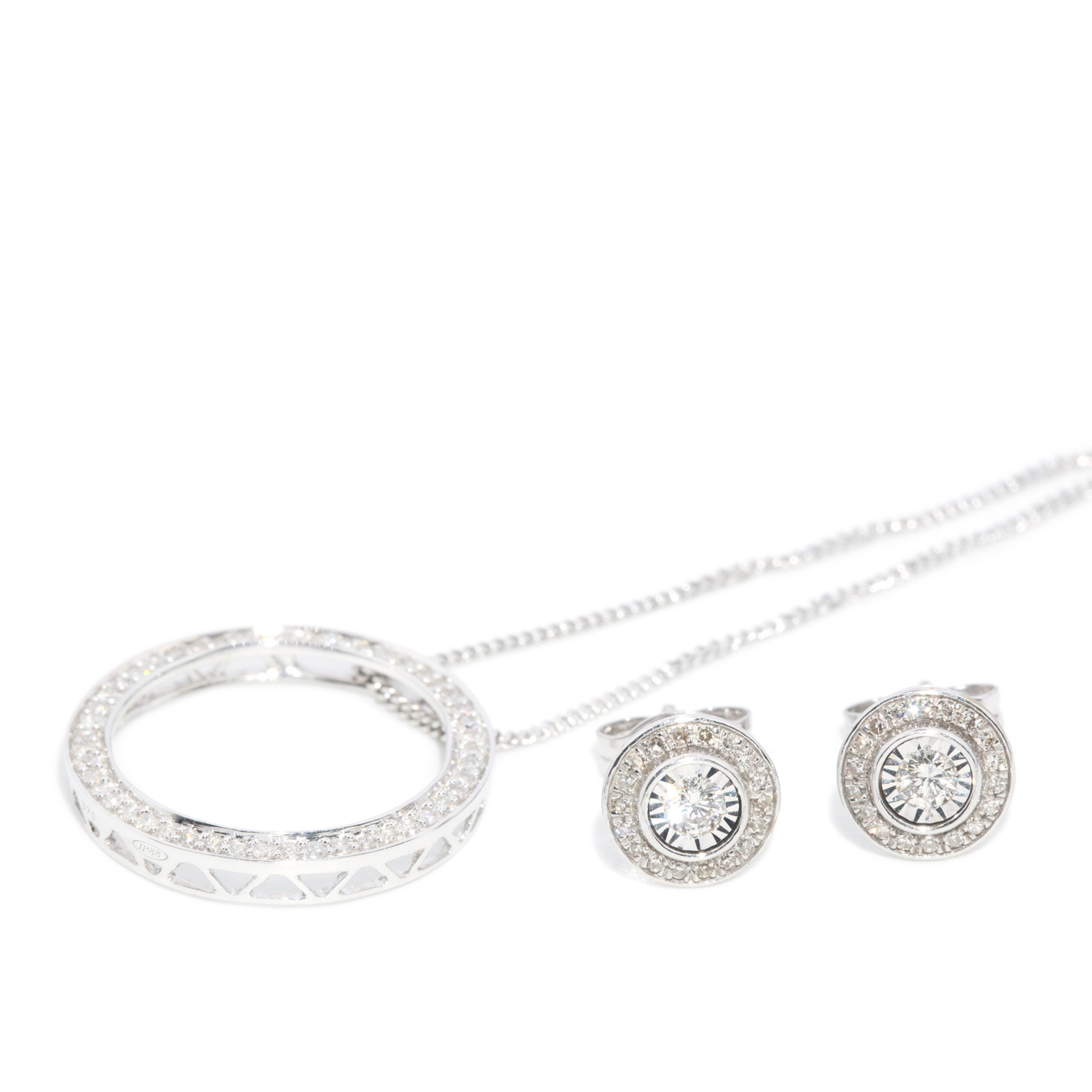 132 · Diamond Studs and Diamond Pendant in 9ct Gold