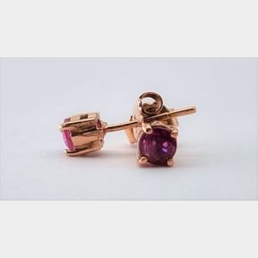 18CT ROSE GOLD STUDS .637CT RUBIES 1.55G - 51611/95